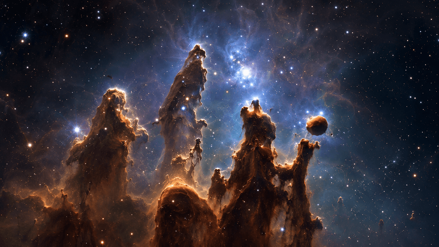 Glowing pillars of gas and dust inside a stellar nursery.
